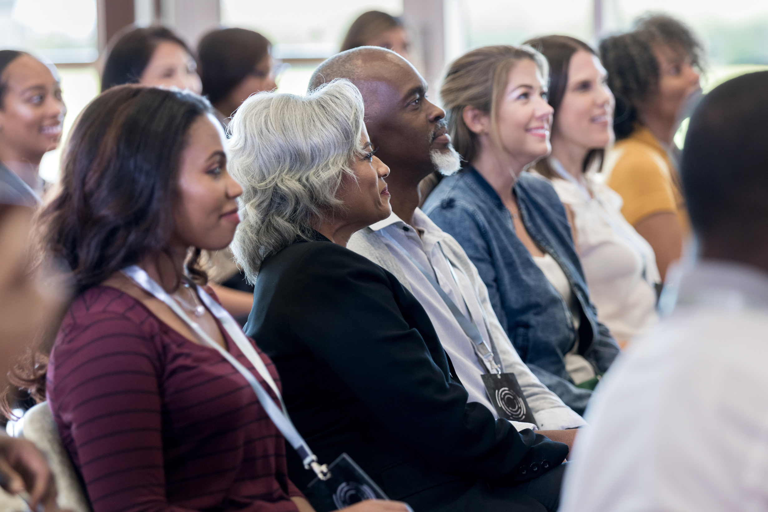 Diverse business conference audience